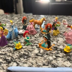 Disney Princess Figurine Collection with Blue, Pink, and Yellow